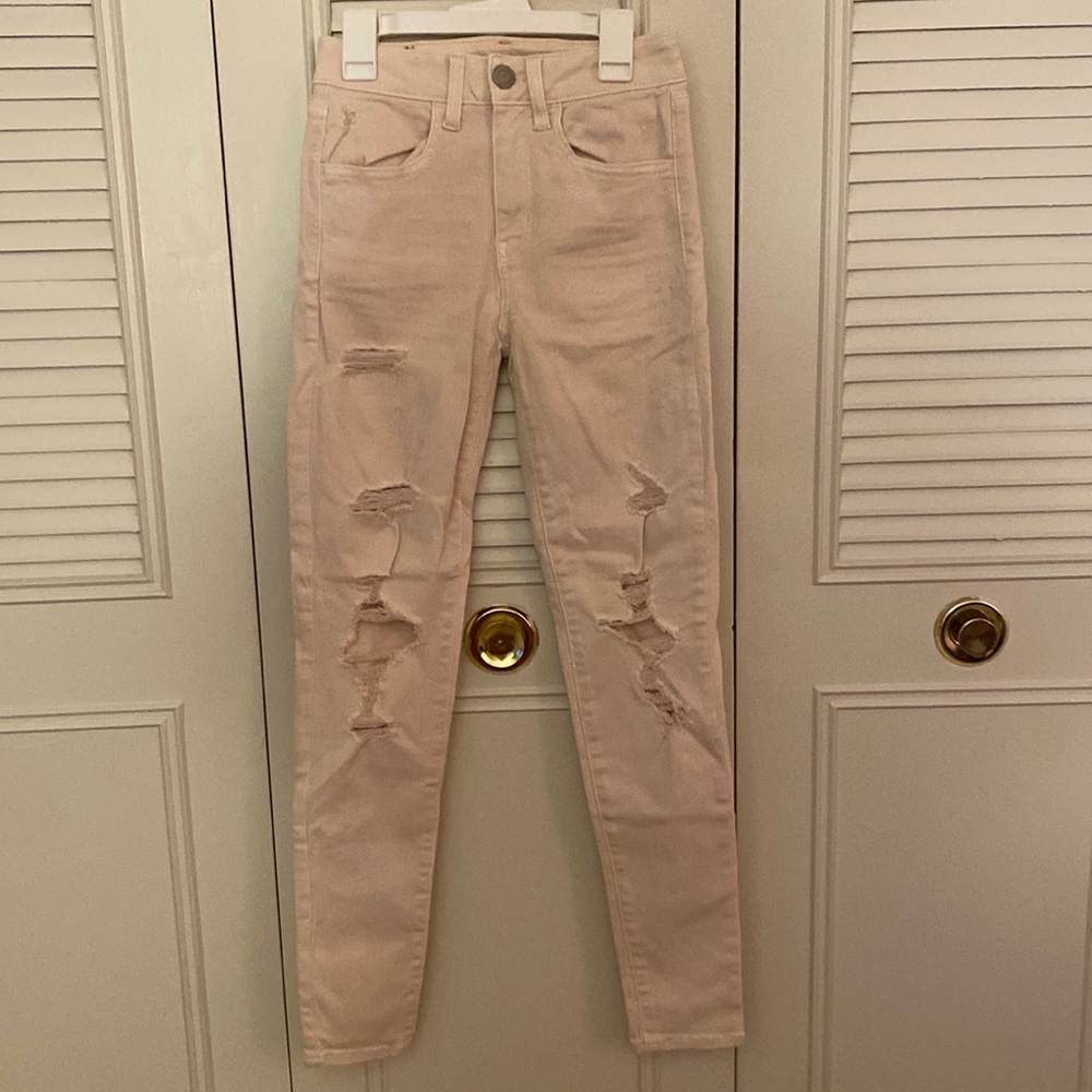 Pink distressed skinny jeans from American Eagle!